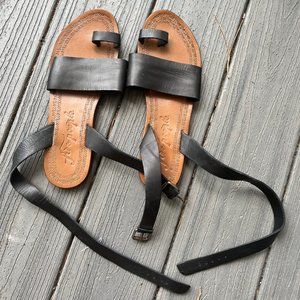 Free People flat black sandals with ankle wrap strap